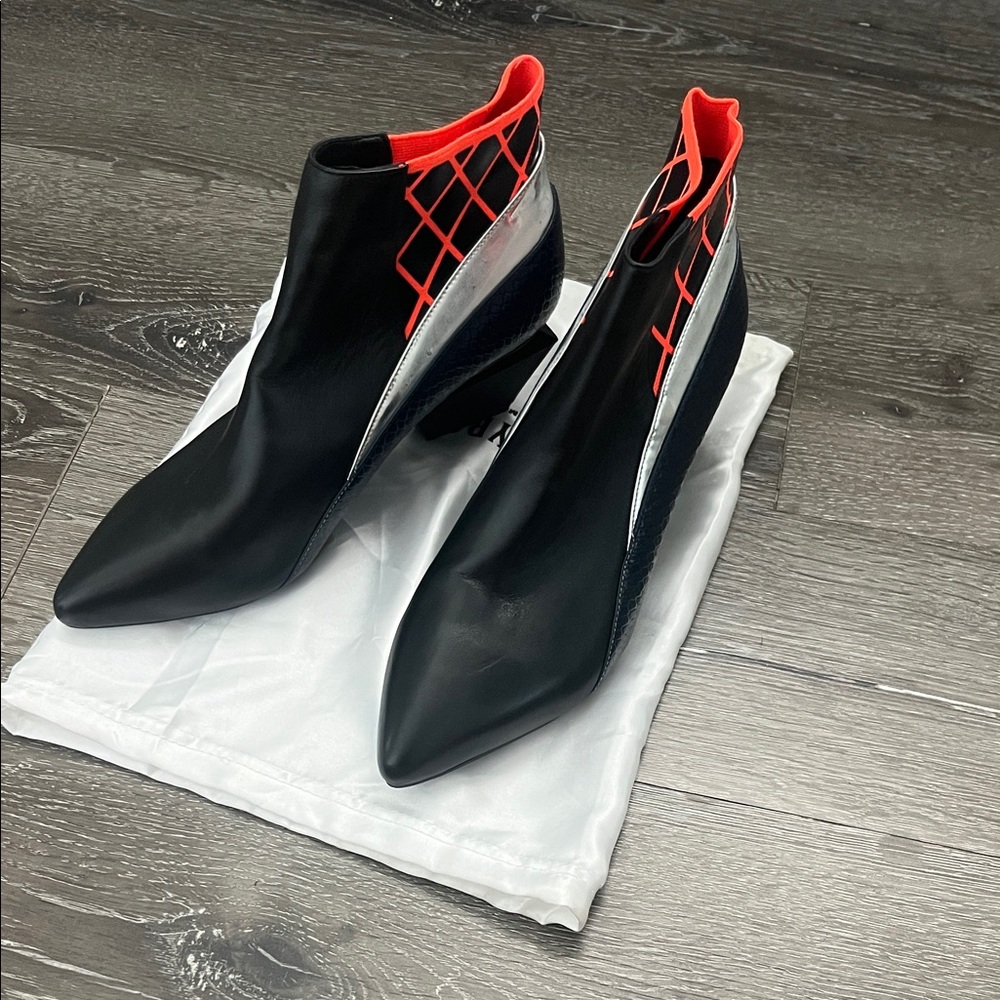 Pointed Black Ankle Booties with Neon Orange Collar and Silver Side Panel